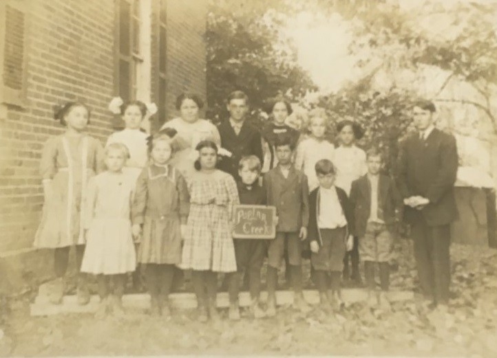 Poplar Creek Students 1911; Teacher is Frank George.