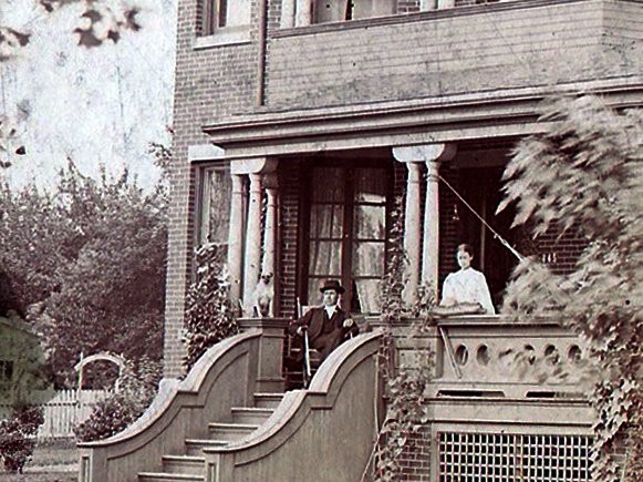 A.W. and Hattie Buck on the front porch of their impressive home.