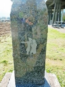 On the front of the marker is the DAR insignia, L&C Corps of Discovery Logo, and the title, "Lewis and Clark Trail".