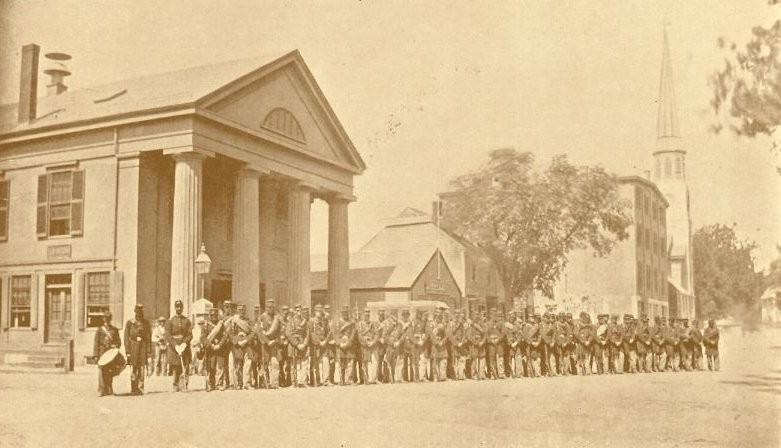 Medford's first city hall, 1861, with Lawrence Light Guard (from "Dedication of the New City Hall")