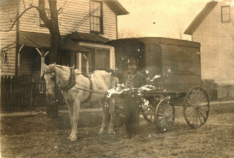 The Wright Brothers employed multiple delivery wagons in order to reach a larger customer base. This wagon was driven by Jim Wright. 