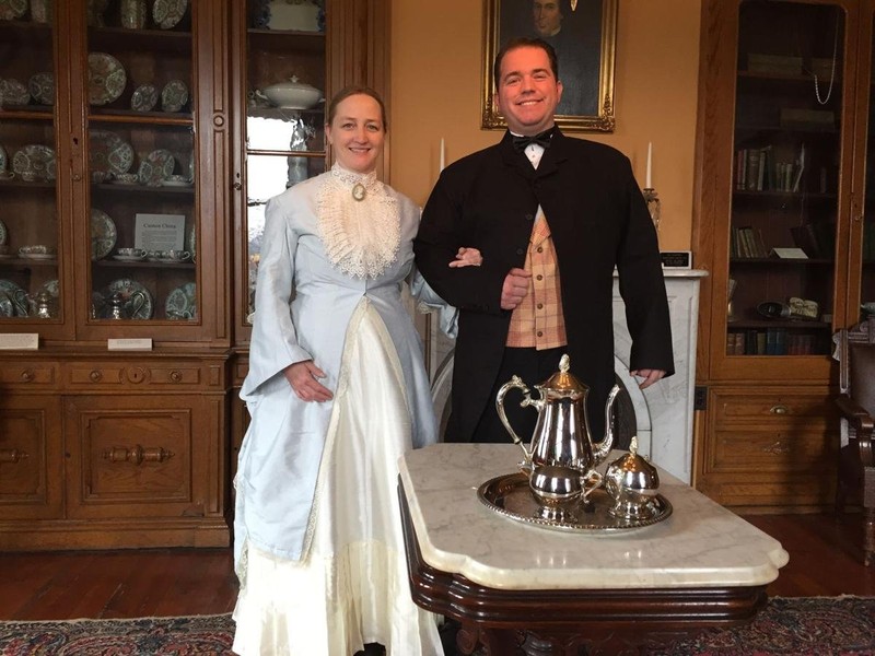 Period actors, dressed as Silas and Clarissa Clark, greet visitors to Victorian Tea in April of 2018.