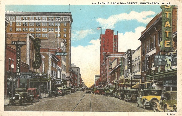 Postcard showing 4th Avenue, including the Palace and other theaters