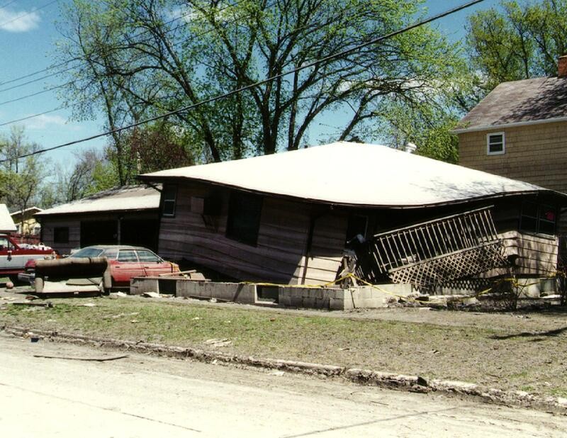 Collapsed home knocked off its foundation.