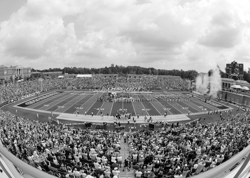 A wide shot of the stadium with views of the entire field, Judy Rose Athletic center, and the crowd in the stands.