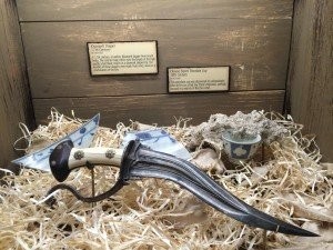 Khanjarli Dagger c. 17th century and Chinese Export Porcelain cup c. 18th century. Credit: St. Augustine Pirate and Treasure Museum