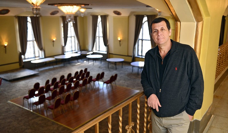 Albert Abdouche, the man responsible for bringing the Americus back to life, stands above one of the hotel's banquet rooms.