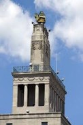 Cenotaph atop the 8 stories that includes the Tomb of the Unknown Soldier & the eternal flame at the top