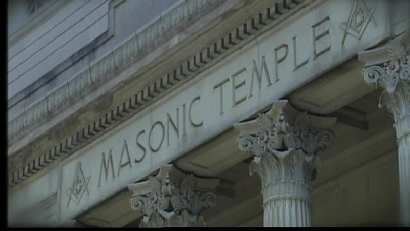 A close up of the entablature above the temple's entrance.  