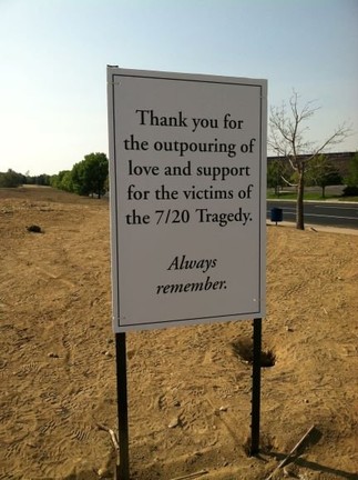 A sign outside Century 16 movie theater in the days following the shooting.