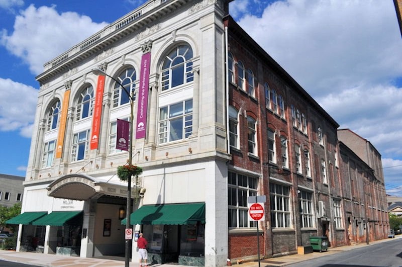 This angle reveals the Beaux-Arts façade and the full size of Miller Symphony Hall.