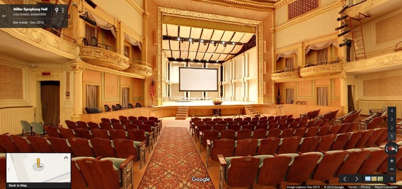 A ground-level view of the hall's renovated stage and new acoustical shell.