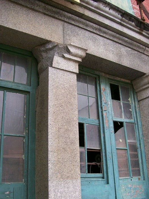 Damage from a cannon can be seen on a cornice