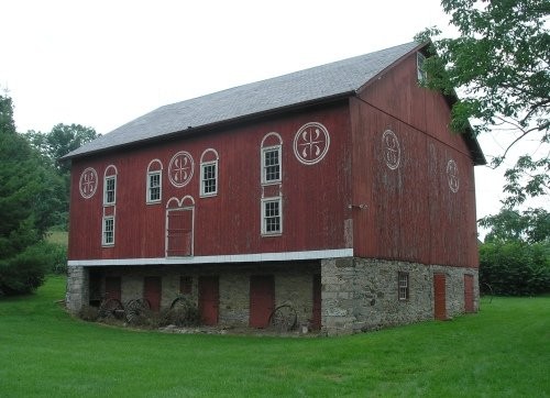 This late 19th century barn now houses vintage farm equipment, carriages and sleighs.