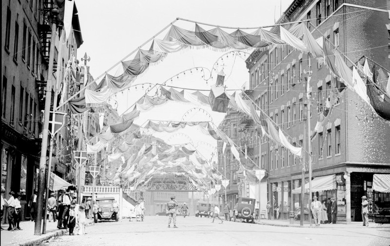 A festival accompanying an Italian saint’s feast on Hanover Street in the North End, ca. 1930. Italian religious festivals played a prominent role in the North End's Italian identity formation since the late 19th century.
Source: “The North End.” Global