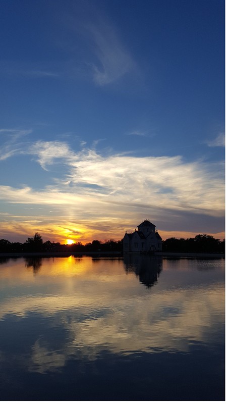 Reservoir and gatehouse at sunset. Photo by me.