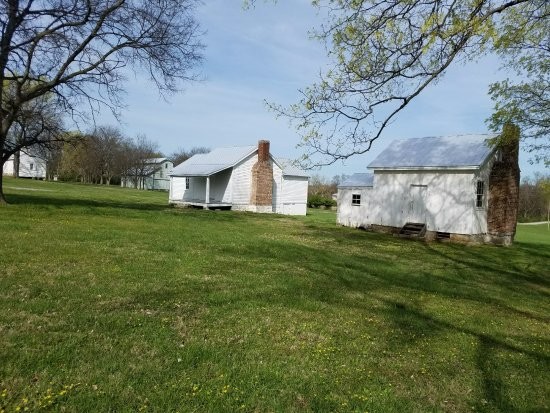 Restored slave cabins at Clover Bottom. c. 1858. Credit: Carver Moore, 2017