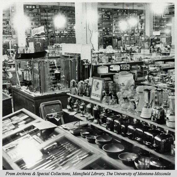 An interior shot of the Missoula Mercantiles kitchen department circa 1950’s. Not the abundance of products on display. The Mercantile was known for having everything a customer wanted, and if they didn’t have it would gladly order the product, if not several more. Image courtesy of mtmemory.org