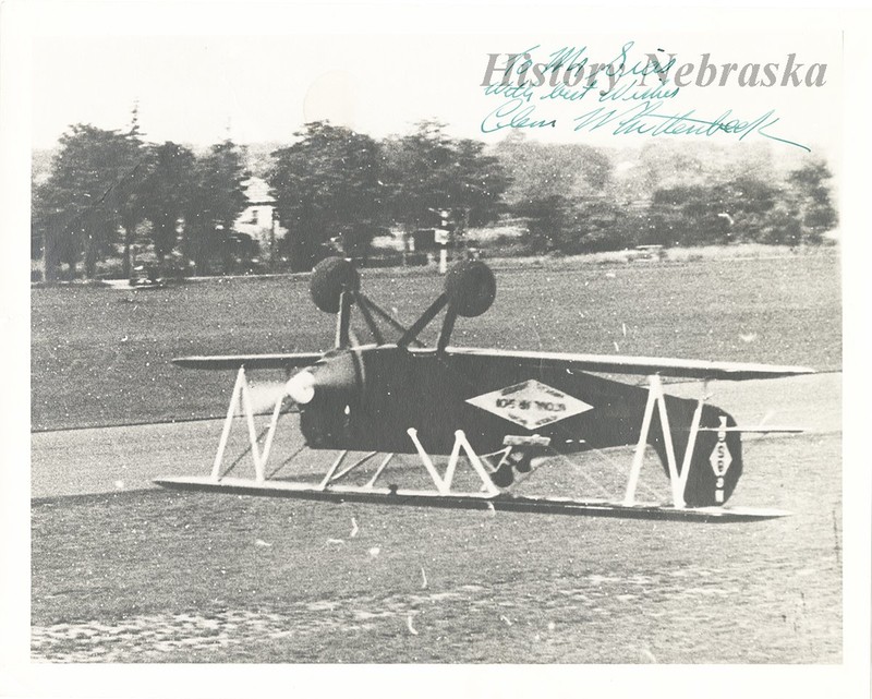 "Photograph taken at the Lincoln Airplane and Flying School in Lincoln, Nebraska. One pilot shows his trickery by flying upside down."