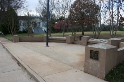 This photo shows where Samuel B. Moore's historical marker is located. It is surrounded by other governors and is located at Capitol Park in Tuscaloosa, Alabama.