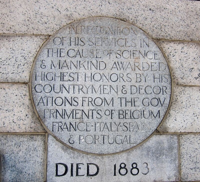 The second plaque on the statue that explains Sims's international fame. 