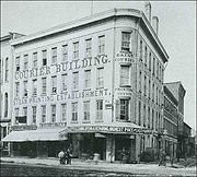 Historic photo of the Courier Building when it housed the Syracuse Daily Courier