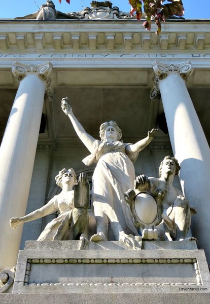 "The Light of the World" was carved by Hungarian native Albert Molnar, Sr. The central figure holds the torch of enlightenment and is framed by figures personifying the law and power.