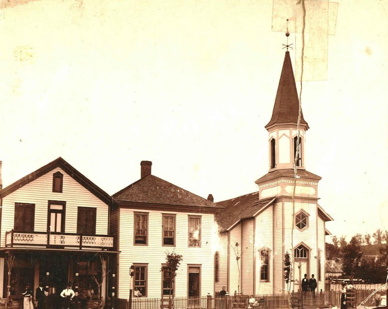 The sanctuary building sometime around the 1890s. The house to its immediate left is likely the parsonage, which was demolished in 1965.