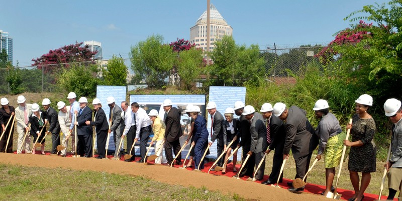 Chancellor Philip L. Dubois and Mayor Pat McCrory gather with city officials for the groundbreaking ceremony to mark the start of construction on the LYNX Blue Line Extension in uptown Charlotte, July 18, 2013.