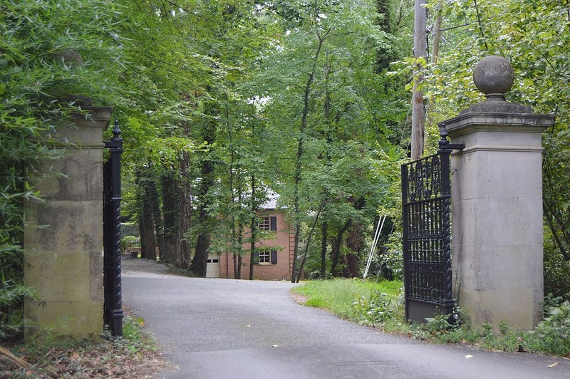 Gated entrance to bridge over creek to Lock Island and the Rice House