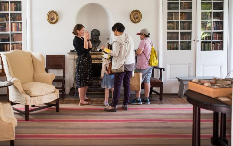 Visitors enjoy a house tour 