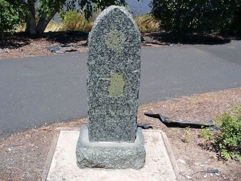 NSDAR insignia, the Lewis & Clark Corps of Discovery logo and the words “Lewis and Clark Trail” highlighted in gold leaf.