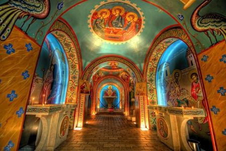 Inside the shrine. Note the Byzantine style frescoes highlighted with 22 Karat gold and art depicting many apostles and saints of the Christian church. Credit: Florida Department of the State