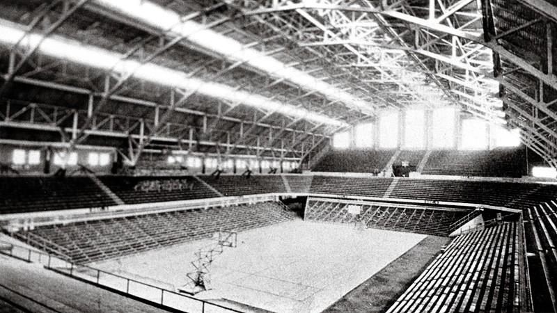 The floor with its original east/west configuration with the setting sun shining onto the court.  The layout was altered in 1933.  