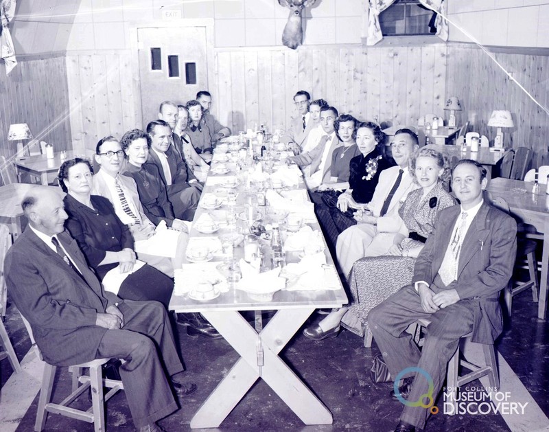 A group of people enjoying booze during prohibition. In this photo, we see how people often associated drinking with social events, even during the time of prohibition.