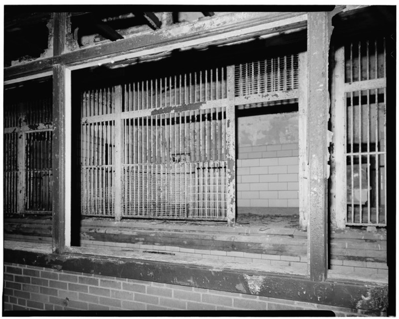 This Black and white photo taken in 1978 shows the typical structure of an animal cage during this time at the Franklin Park Zoo. (Historic American Buildings Survey, By: Jack Maley, Photographer May 31, 1978 TYPICAL FELINE CAGE - Franklin Park Zoo)