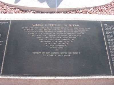 Plaque describing the elements of the monument and what each aspect symbolizes.