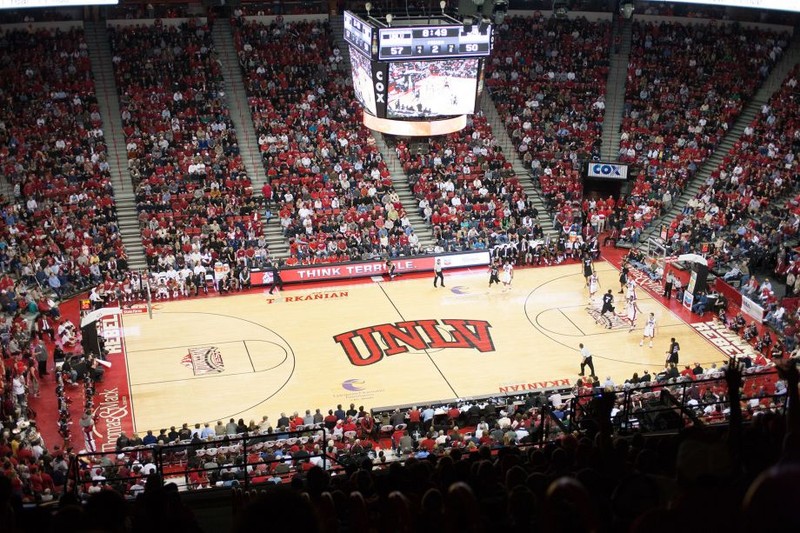 Panoramic view of the inside of the arena during a basketball event. 