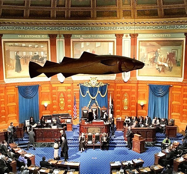 The Sacred Cod hanging in its current day location in the Chamber of the House of Representatives in the Massachusetts State House.