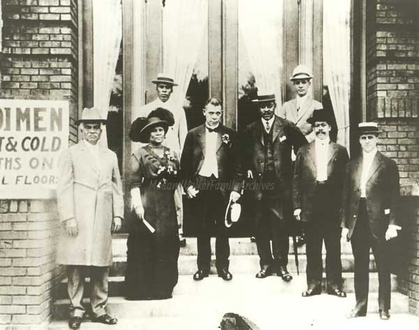 Madame Walker (second from left) with George Knox (far left), publisher of the Indianapolis Freeman, Booker T. Washington (third from left) and the board of the Indianapolis YMCA.  