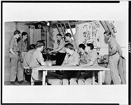 Enrolees at Camp Nine Mile in a class about radios. Fort Missoula's radio station frequently communicated with the CCC troop at Nine Mile. (Photo 1938)