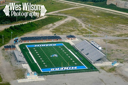 An aerial view of the James H. "Buck" Harless Stadium showing off the full entirety of the facility. 