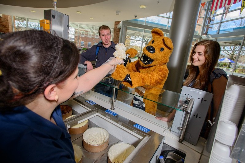 Everyone gets ice cream at the creamery throughout the year, even the Nittany Lion. This photo was taken by Michelle Bixby with the Penn State news.