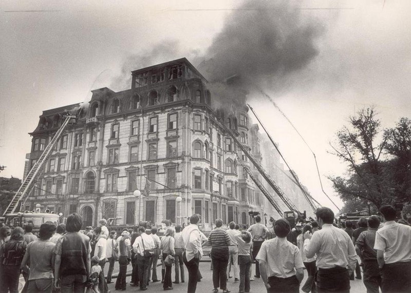 Photo of the fire and firefighters working to put it out (via Boston Globe)