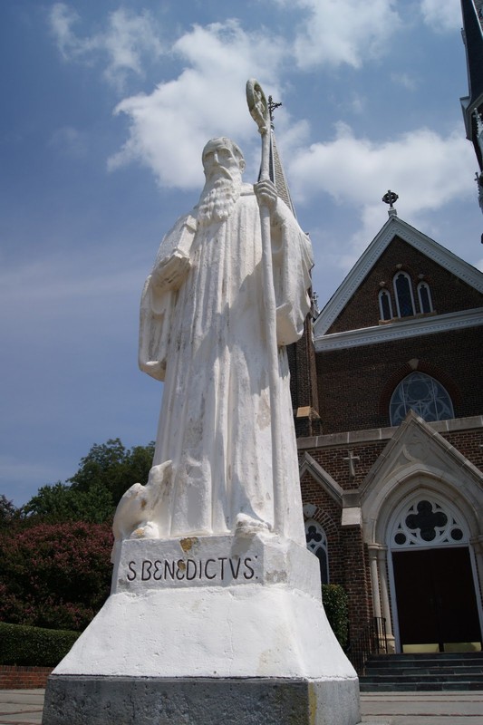 Statue of St. Benedict, founder of the Benedictine order, at the entrance of the Basilica.