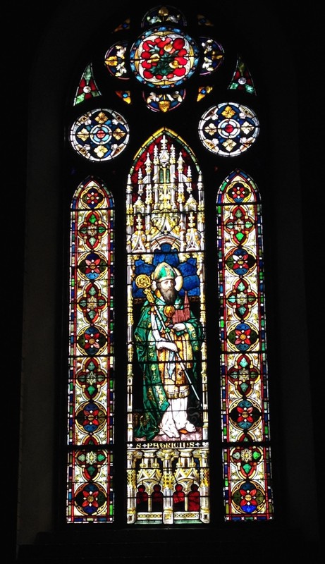 Painted window of St. Patrick, located in the interior of the Abbey Basilica. Created by the Royal Bavarian Establishment of Francis Meyer & Company in Munich, Germany, 1890s.