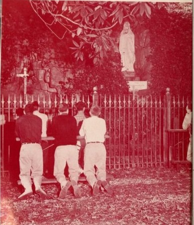 Students praying at the Grotto, 1957. Source: The Spire (Belmont, NC: Belmont Abbey College, 1957). 