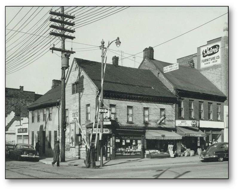 Photograph of the Golden Plough Tavern and the General Gates House before restoration work began in the early 1960s.