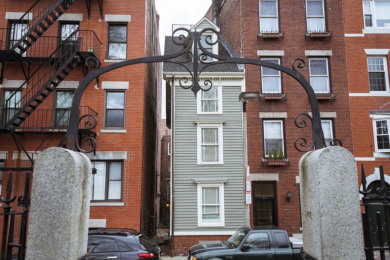 View of the Skinny House from the archway of Copp's Hill Burying Ground.