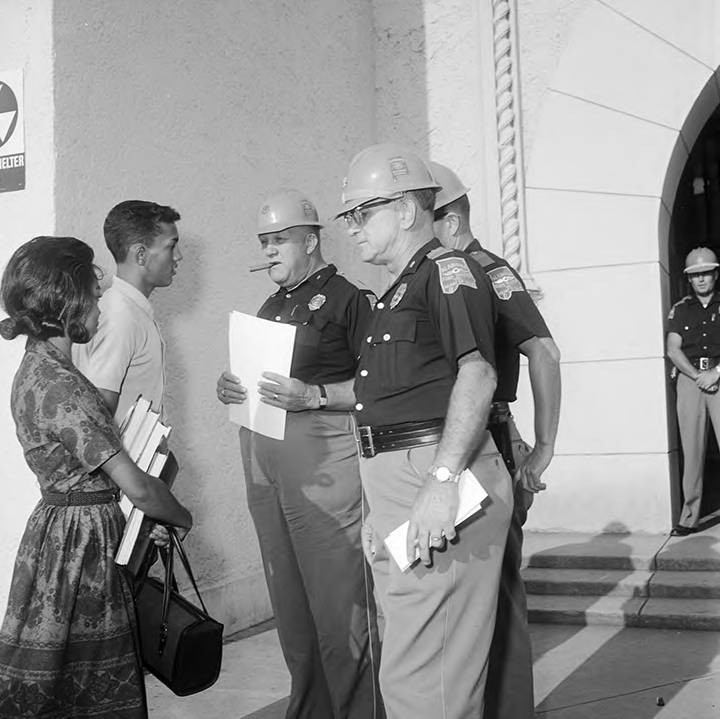 State troopers preventing Henry Hobdy and Dorothy Davis from entering Murphy High School in Mobile, Alabama.